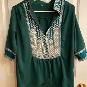 Women’s emerald green blouse